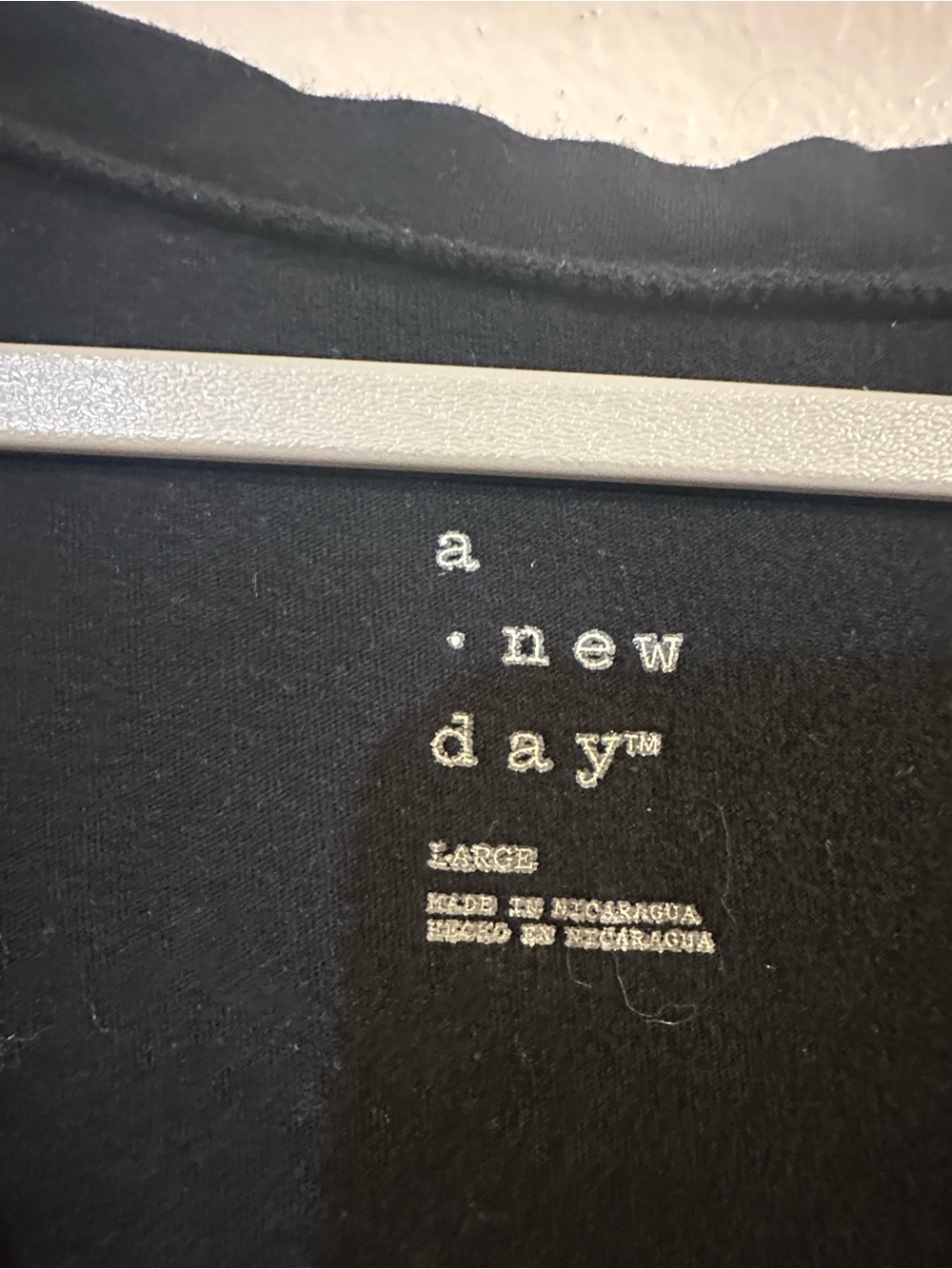 a new day Black Tee with Subtle Logo
